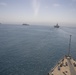 U.S. Marines aboard USS Pearl Harbor provide security during strait transit training