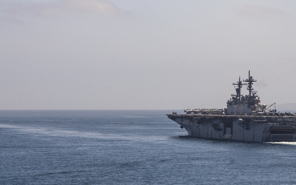 U.S. Marines aboard USS Pearl Harbor provide security during strait transit training