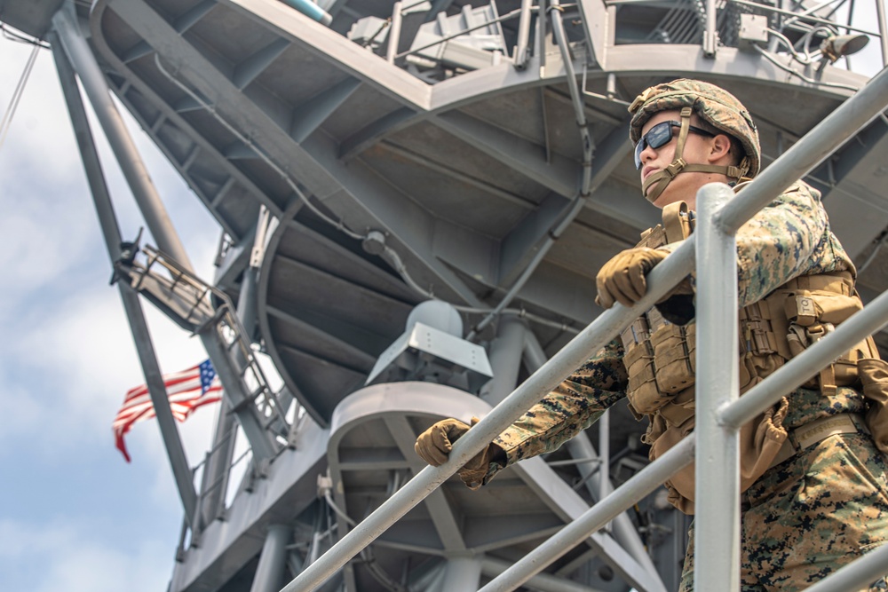 U.S. Marines aboard USS Pearl Harbor provide security during strait transit training