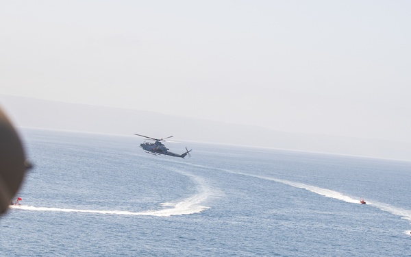 U.S. Marines aboard USS Pearl Harbor provide security during strait transit training