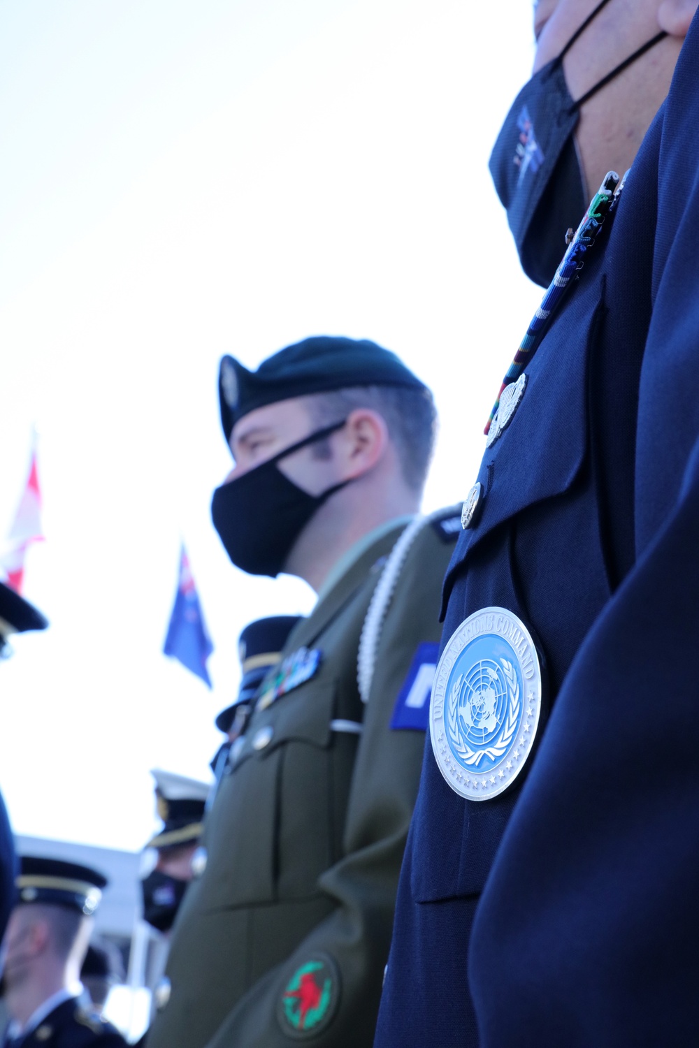 UNC watch the memorial ceremony during Turn Toward Busan