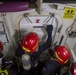 USS America (LHA 6) Sailors fight a simulated fire.