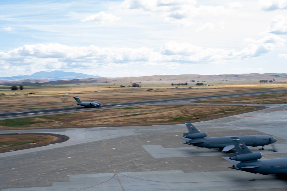 Photos of aircraft on the 60th AMW flight line