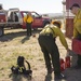 Camp Guernsey prepares for fire season with prescribed burn and bucket drop exercise
