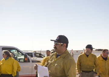 Camp Guernsey prepares for fire season with prescribed burn and bucket drop exercise