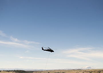 Camp Guernsey prepares for fire season with prescribed burn and bucket drop exercise