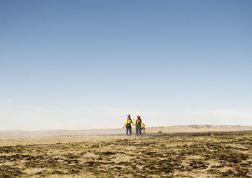 Camp Guernsey prepares for fire season with prescribed burn and bucket drop exercise