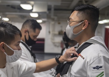 USS America (LHA 6) Sailors Conduct Dress White Uniform Inspections.