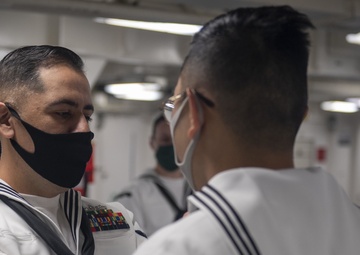 USS America (LHA 6) Sailors Conduct Dress White Uniform Inspections.