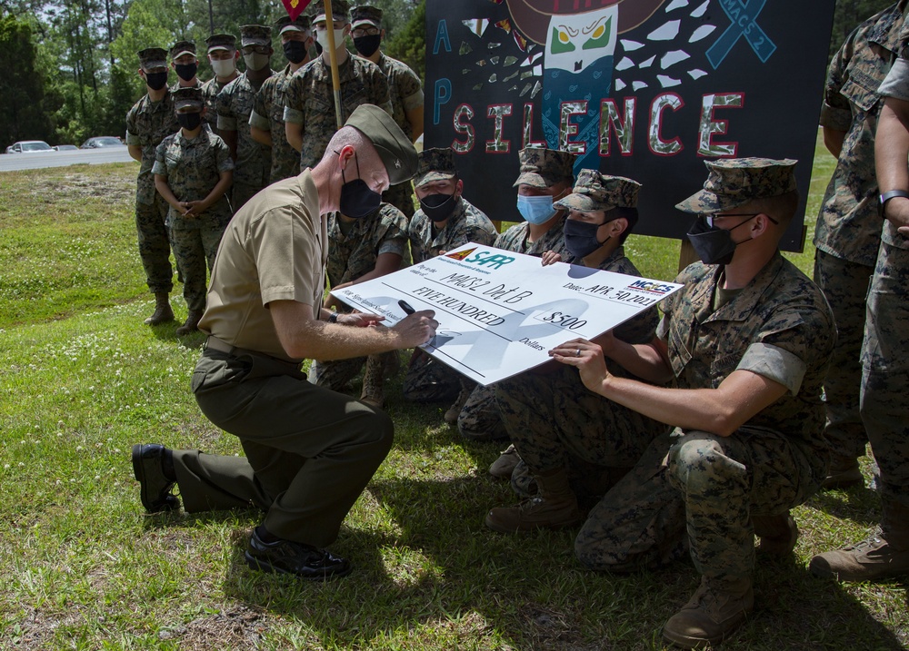 MCAS New River awards Det B with Marine Air Control Squadron 2 first place in the SAAM Poster contest