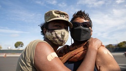 Cal Guard Soldier and her mother celebrate reunion with COVID-19 vaccinations