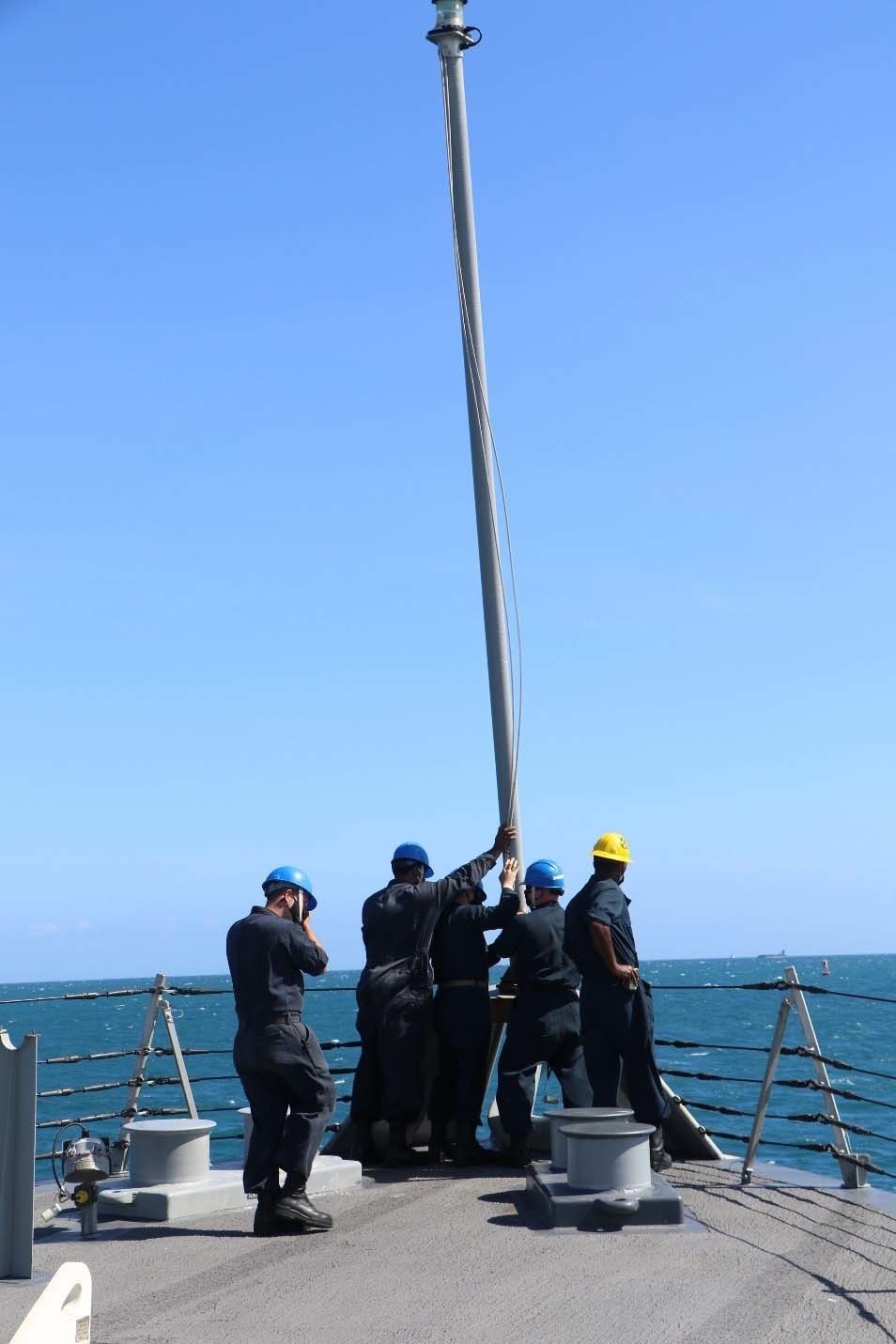 Sailors Assigned to USS Wichita Raise the Jackstaff as the Ship Pulls into Ponce, Puerto Rico