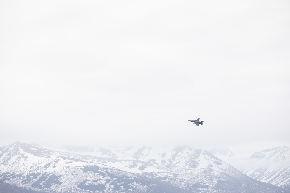 Chugach Mountains host an F-16 Fighting Falcon during NE21