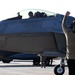 90th AMU Airman directs F-22 Raptor for maintenance
