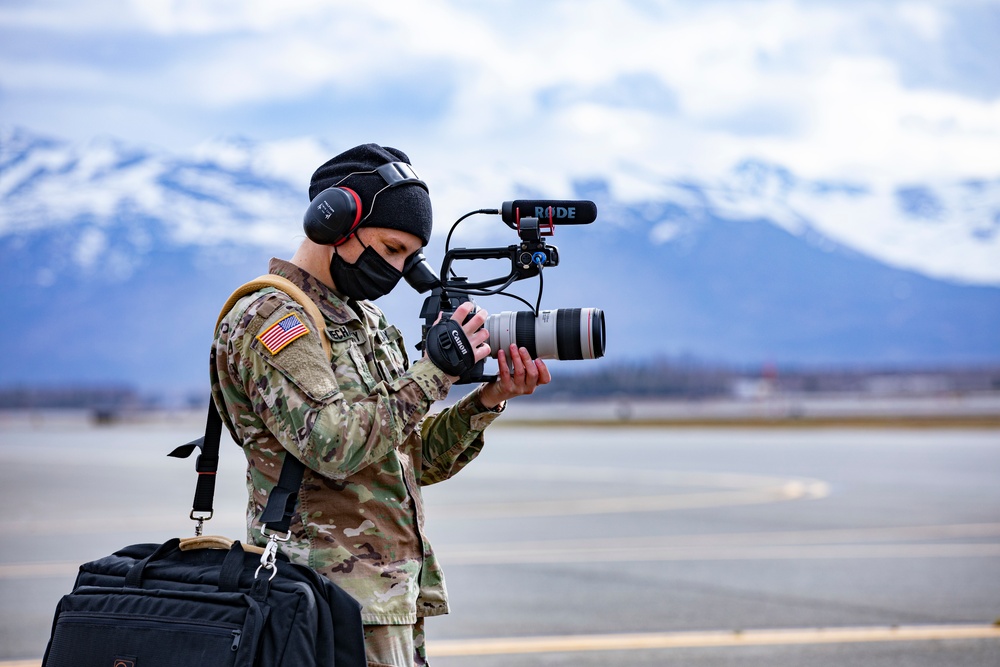 Public affairs shoots Canon on the flight line