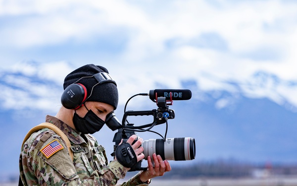 Public affairs shoots Canon on the flight line