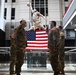 Staff Sgt. Chase Warren reenlists at the Michael Jordan statue at the United Center COVID-19 Community Vaccination Center, Chicago