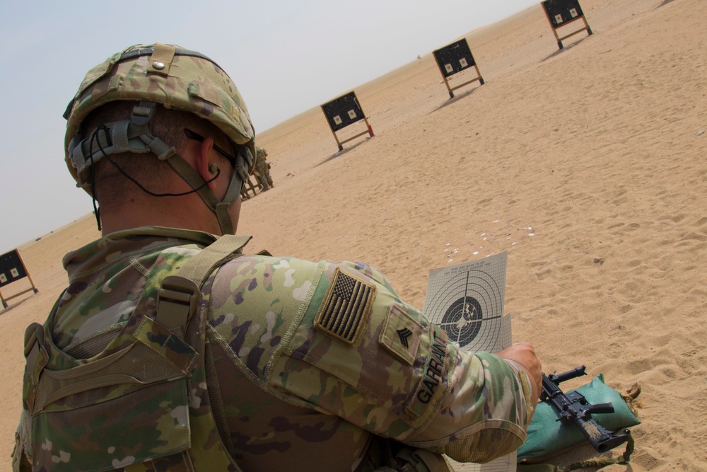 Soldiers compete in Task Force Spartan 2nd Annual Small Arms Marksmanship Competition