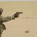 Staff Sgt. Aaron Merono, 36th Infantry Division, competes in Task Force Spartan small arms marksmanship competition