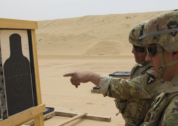 36th Infantry Division, Task Force Spartan, Soldiers check their targets after shooting in TF Spartan small arms competition