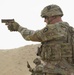 Maj. Gen. Patrick Hamilton, commanding general of 36th Infantry Division, Task Force Spartan, shoots the SIG Sauer M17 with the winners of TF Spartan 2nd Annual Small Arms Marksmanship Competition