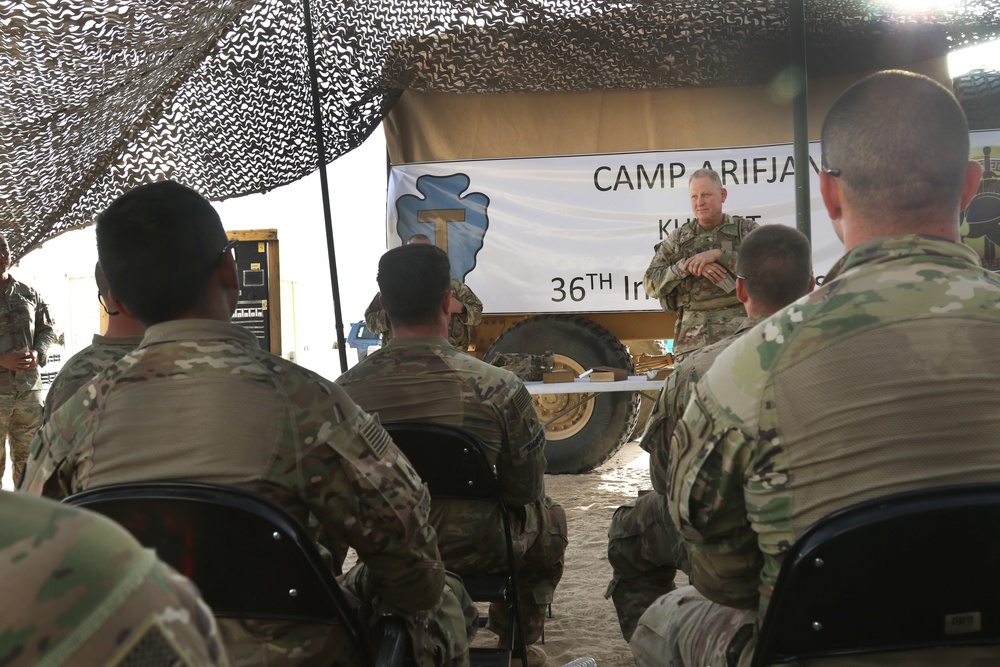 Maj. Gen. Patrick Hamilton, commanding general for Task Force Spartan, speaks to the winners and participants of the TF Spartan 2nd Annual Small Arms Marksmanship competition