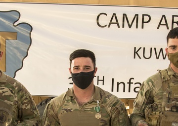 The winners of the Task Force Spartan 2nd Annual Small Arms Marksmanship Competition pose with their commendations