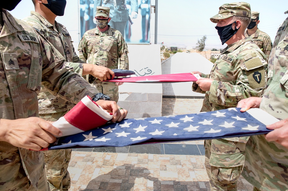 US Soldiers Exchange Flag in Ceremony- Desert Warrior 21