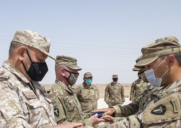 Desert Warrior 21 Participants Exchange Flags in Ceremony