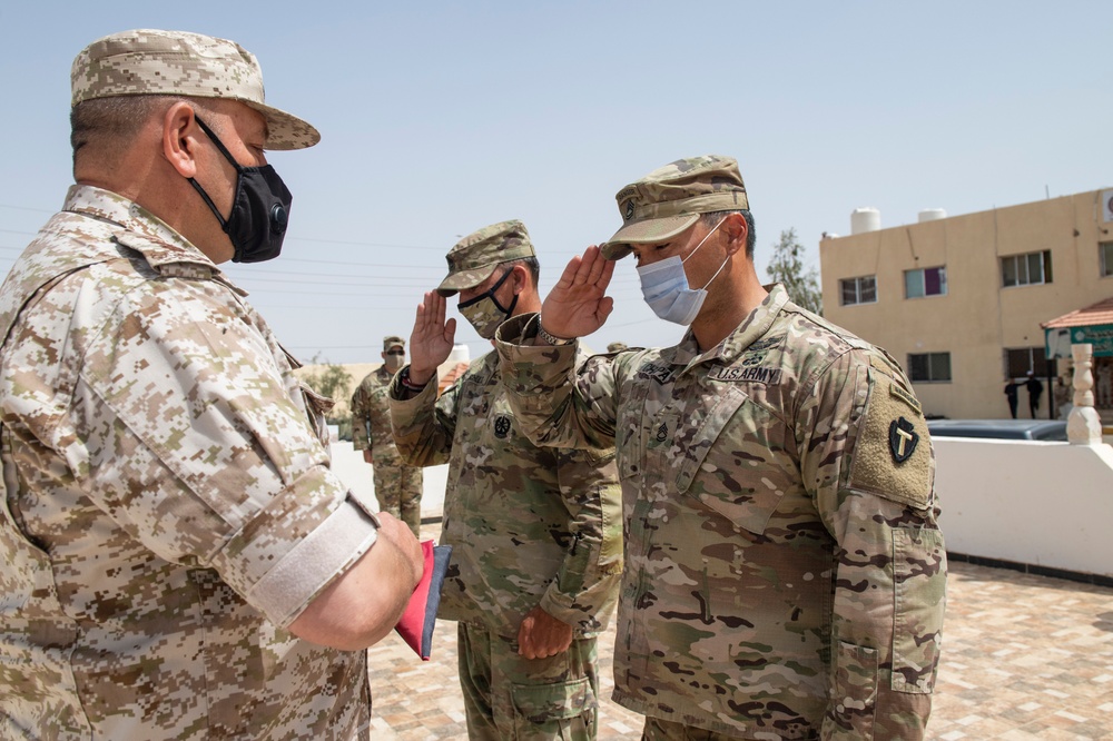 US Soldier Salutes Flag at Flag Exchange Ceremony