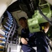 U.S. Navy Sailor Loads a 30mm Gun Aboard USS Sioux City