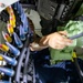 U.S. Navy Sailor Loads a 30mm Gun Aboard USS Sioux City