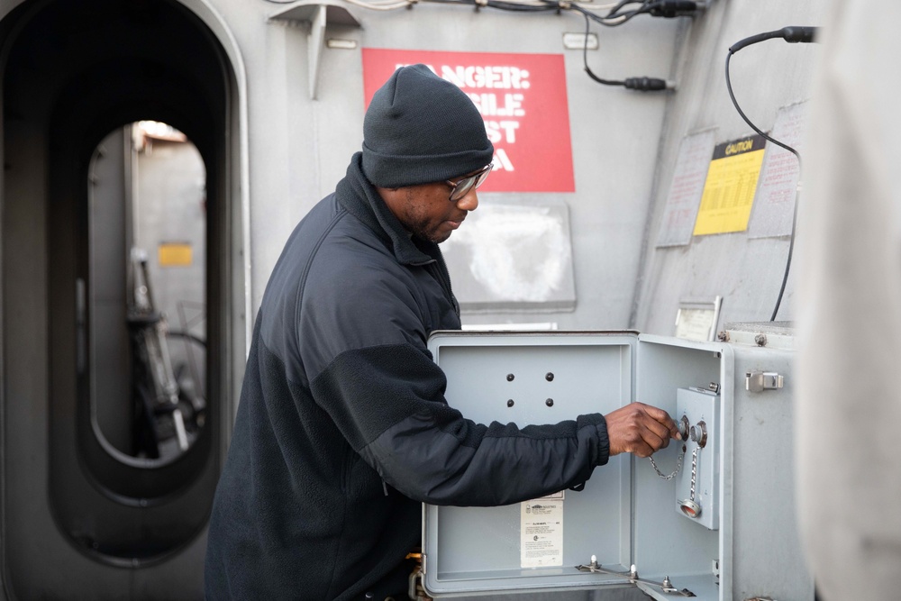 U.S. Navy Sailor Arms the Launch System on the Rolling Airframe Missile Deck Aboard USS Sioux City