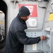 U.S. Navy Sailor Arms the Launch System on the Rolling Airframe Missile Deck Aboard USS Sioux City