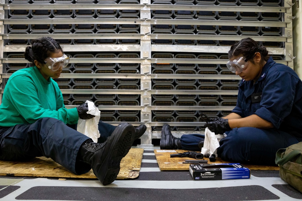 U.S. Navy Sailors Assigned to USS Sioux City and HSC 22 Conduct Small Arms Maintenance Training