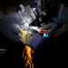 U.S. Navy Sailor Conducts Metal Work in the Oil Lab on USS Sioux City