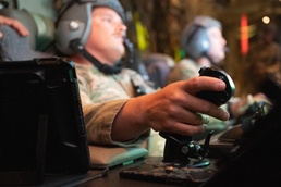 An AC-130J Gunship trains with Multinational forces during Trojan Footprint 21.