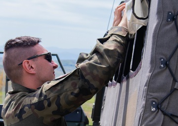 Polish KFOR soldiers conduct ABL patrol