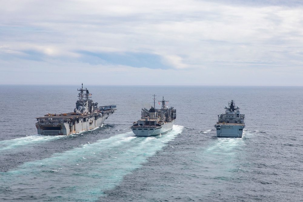 USS Iwo Jima Conducts RAS with USNS Supply and HMS Albion