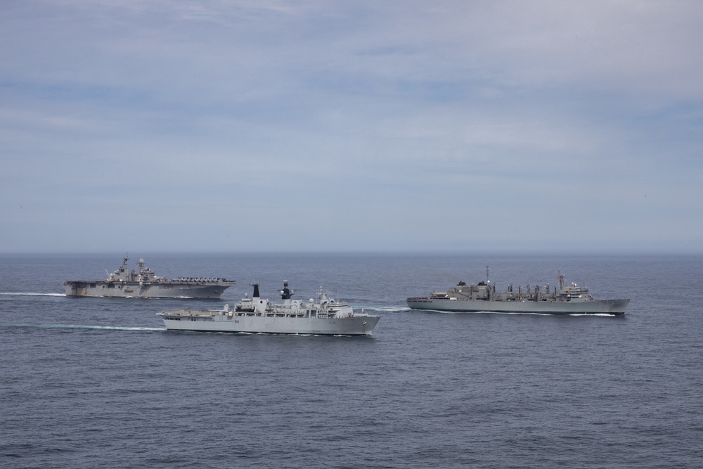 USS Iwo Jima Conducts RAS with USNS Supply and HMS Albion