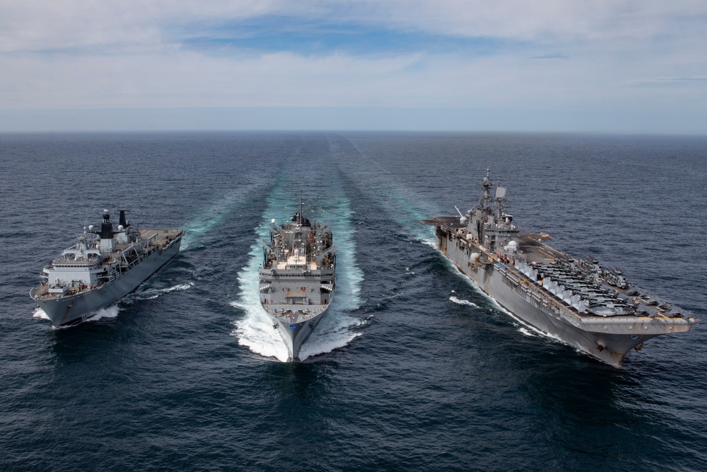 USS Iwo Jima Conducts RAS with USNS Supply and HMS Albion