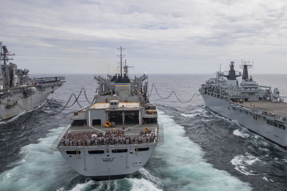 USS Iwo Jima Conducts RAS with USNS Supply and HMS Albion