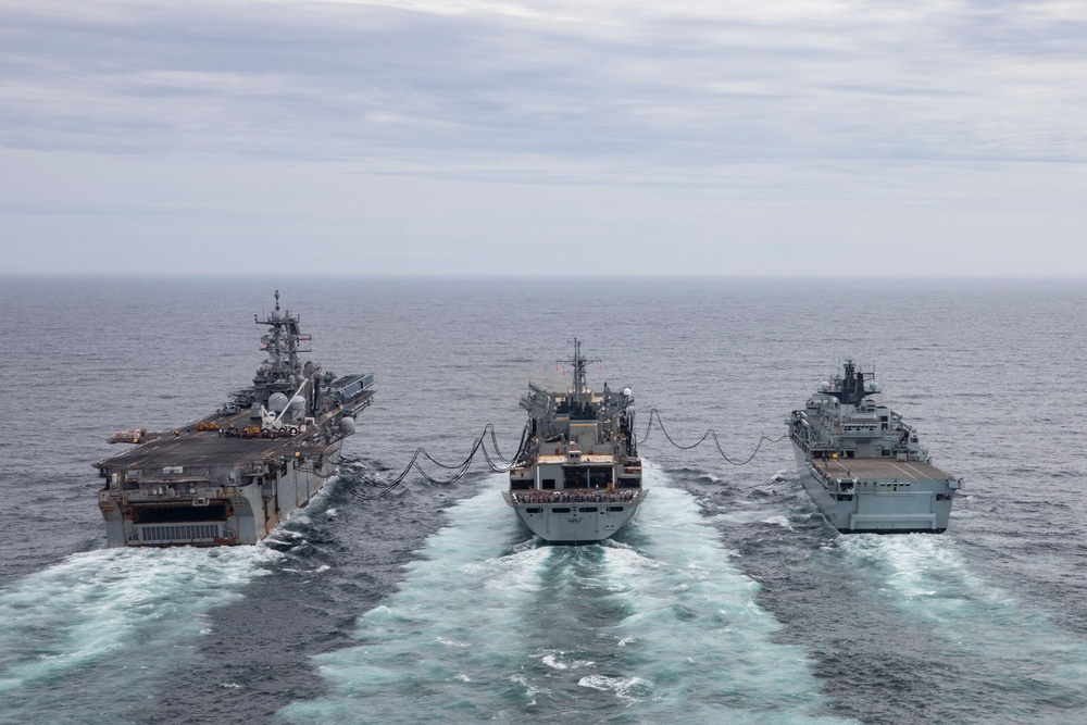 USS Iwo Jima Conducts RAS with USNS Supply and HMS Albion