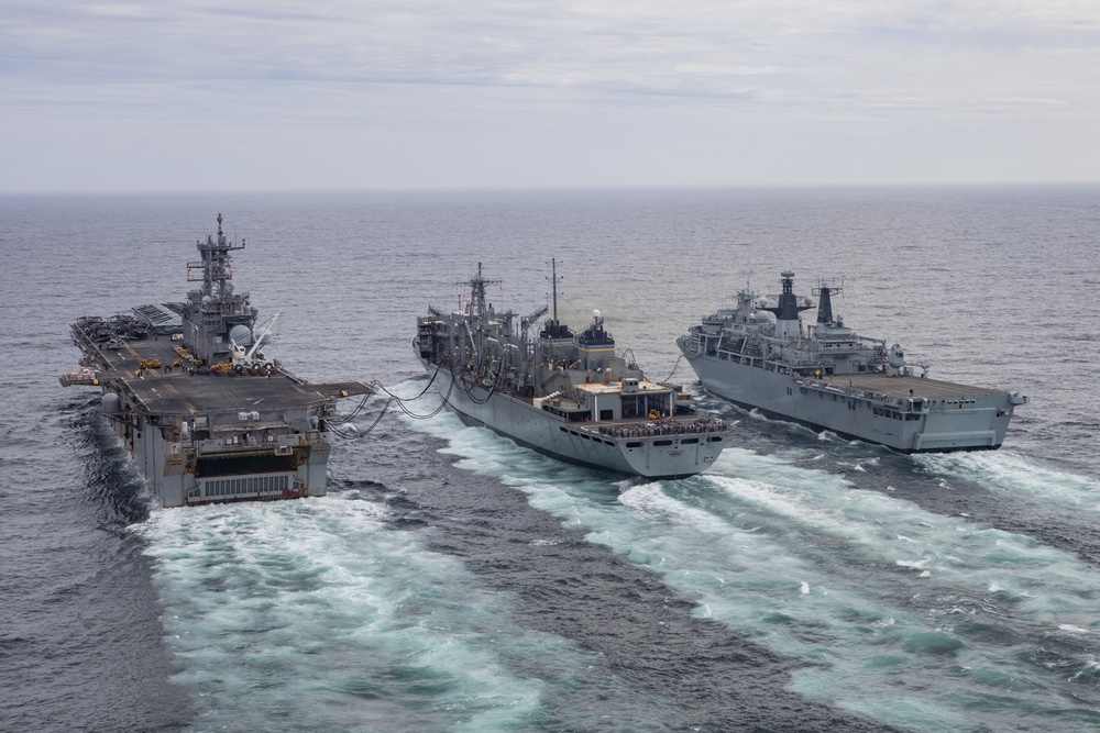 USS Iwo Jima Conducts RAS with USNS Supply and HMS Albion