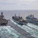 USS Iwo Jima Conducts RAS with USNS Supply and HMS Albion