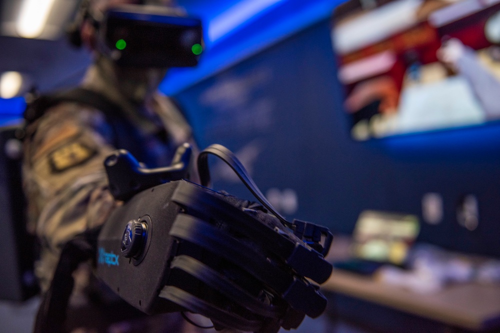 317th AW leaders test state-of-the-art VR gloves