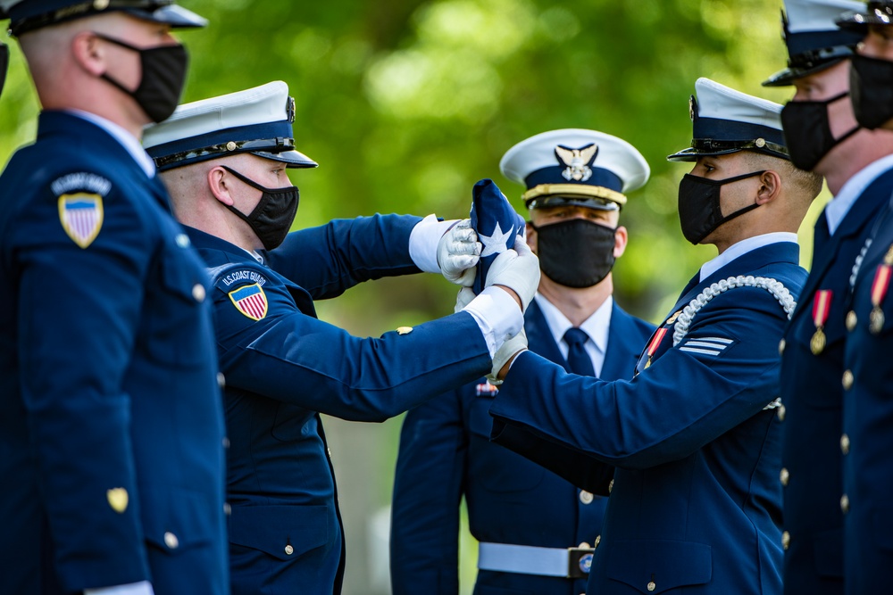 Military Funeral Honors with Funeral Escort are Conducted for retired U.S. Coast Guard Rear Adm. Marshall E. Gilbert in Section 33