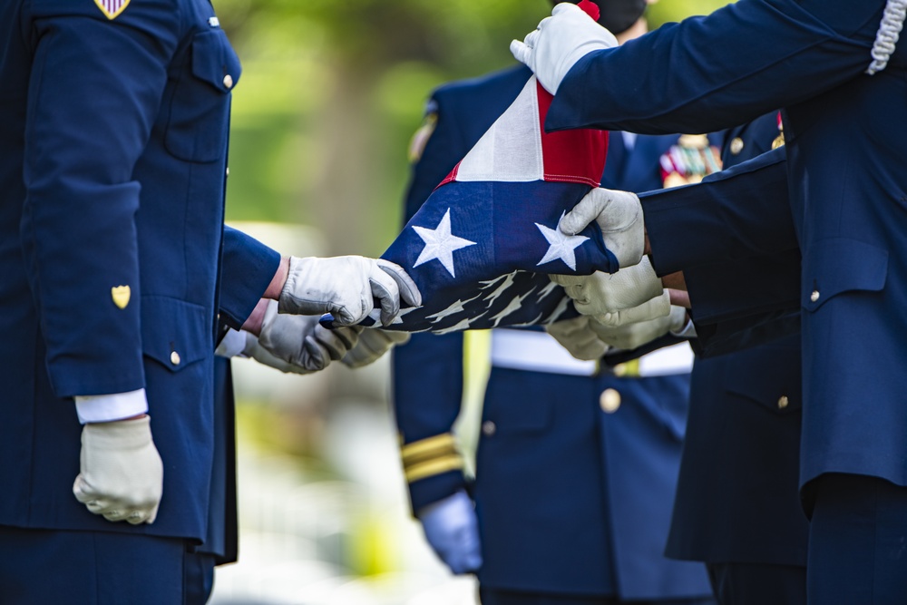 Military Funeral Honors with Funeral Escort are Conducted for retired U.S. Coast Guard Rear Adm. Marshall E. Gilbert in Section 33