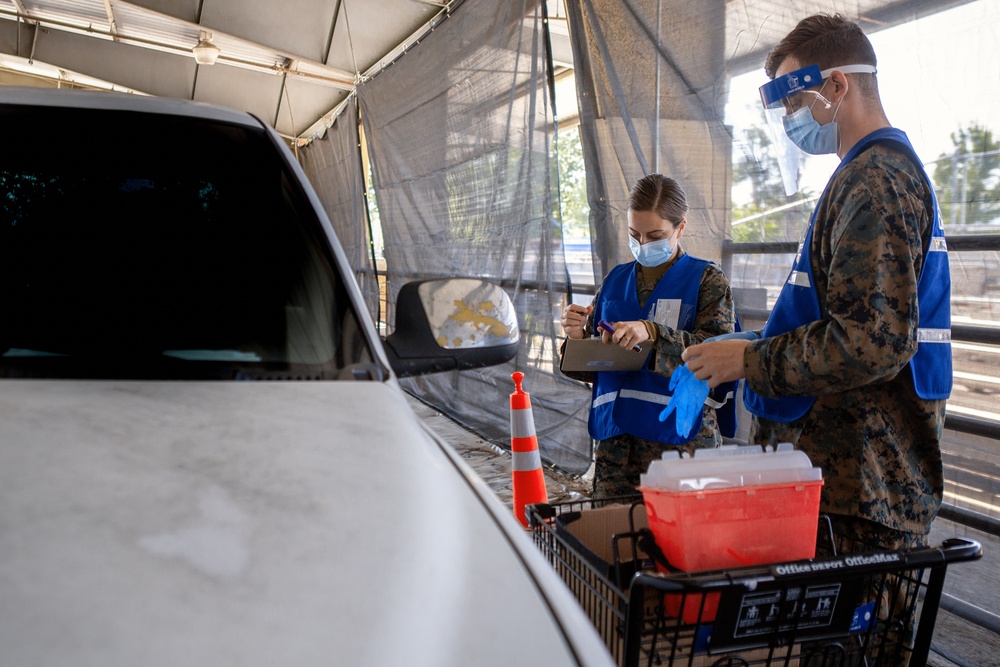 U.S. Sailors Operate the Drive Through Clinic at Jackson County Community Vaccination Center, Oregon