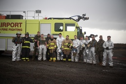 15th MEU expeditionary firefighting and rescue Marines work alongside local firefighters during real-world aircraft recovery